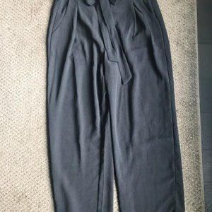 Black crepe cropped trousers.